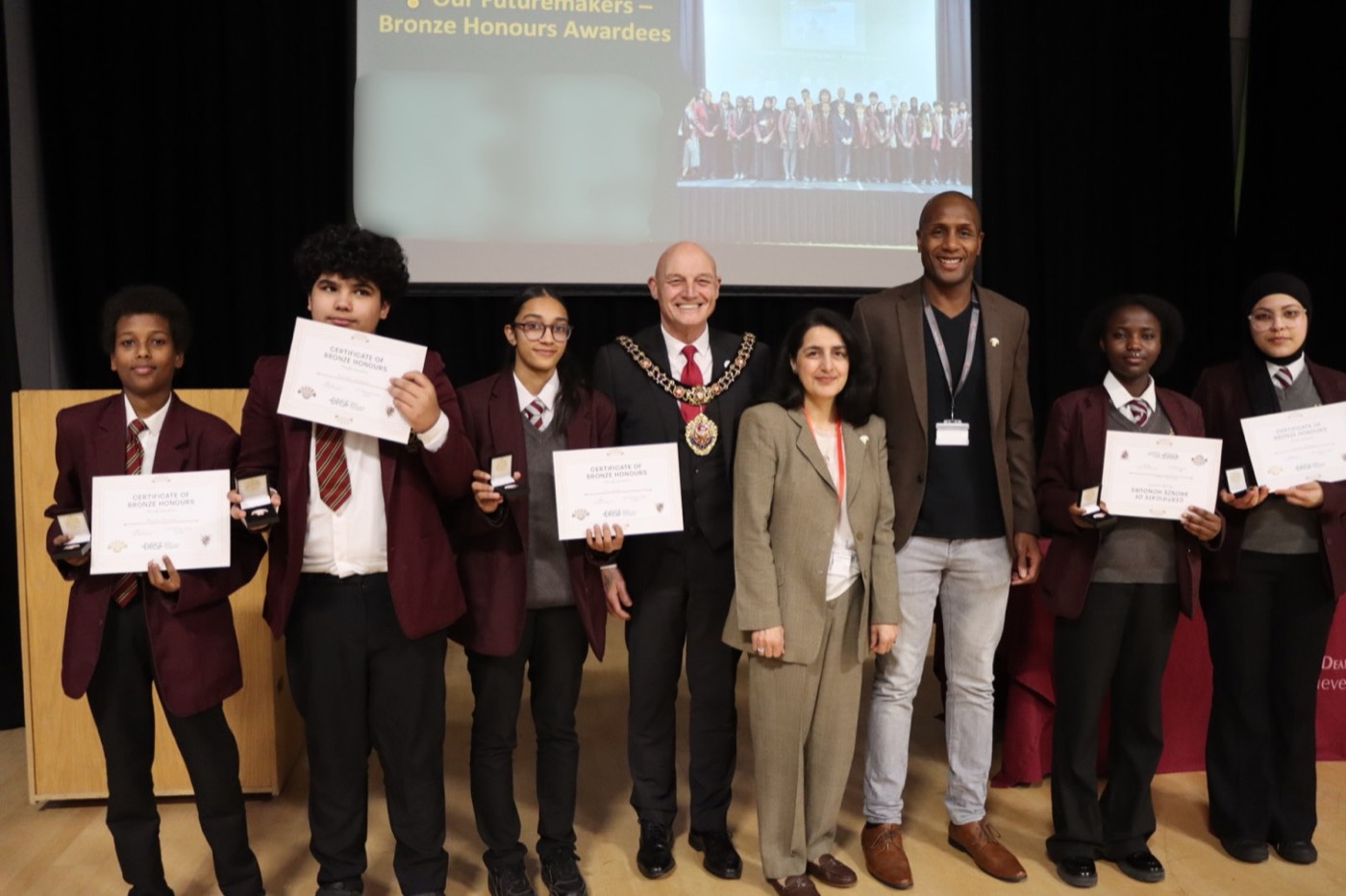 Pupils celebrating their DRSF Bronze Honours awards with certificates